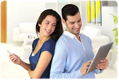 Image of woman holding iPhone and man holding iPad