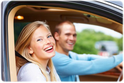 Happy Florida couple in car who took BDI class online