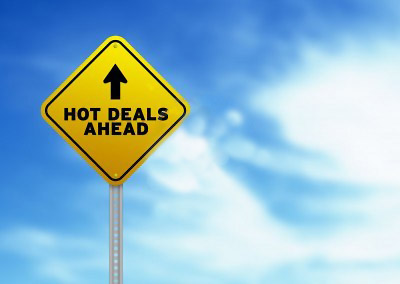 Traffic sign showing hot deals ahead