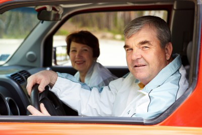 Smiling mature driver in truck